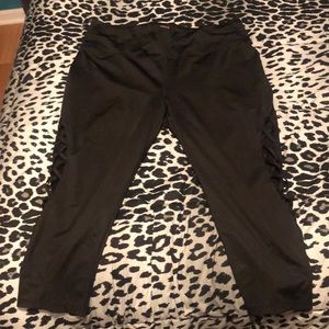 Workout capris with criss cross sides
